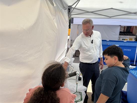 Rep. Peters and kids discuss their rover project at the Ocean Discovery Institute