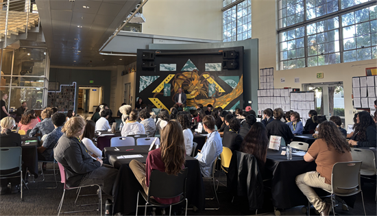 Rep. Peters speaks to a crowd of students at High Tech High