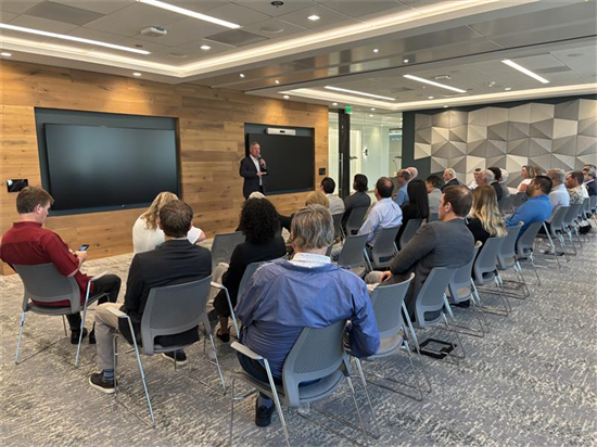 Rep. Peters speaking to an audience of Cleantech San Diego employees