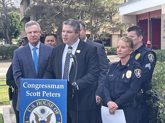 Rep. Scott Peters at a press conference for his Providing Child Care for Police Officers Act