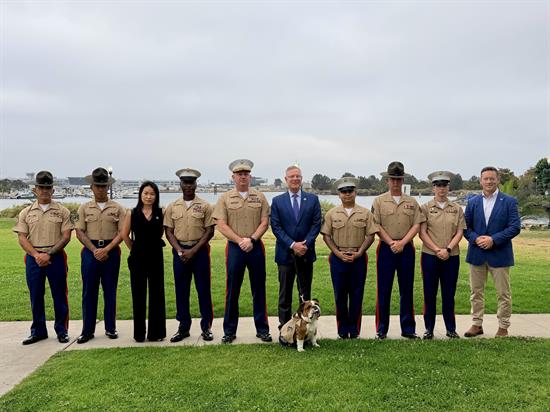 Rep. Peters stands with Marines at the Marine Corps Recruit Depot graduation 