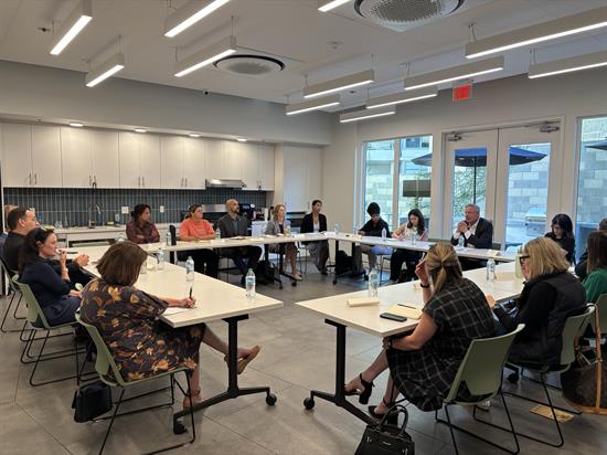 Rep. Peters speaks with a group of homelessness service providers