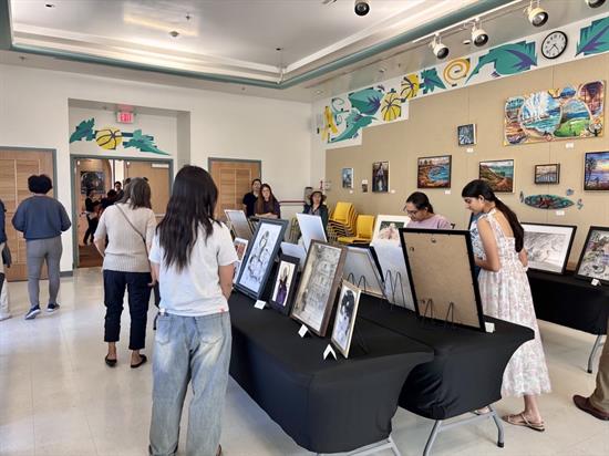 Participants admire the art from the 2026 Art Competition