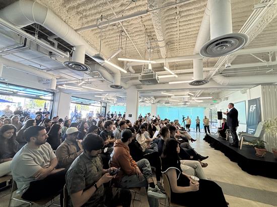 Rep. Peters speaks to a crowd of students at EF International School
