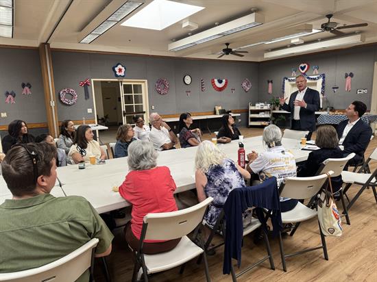 Rep. Peters talks to business leaders at a roundtable event