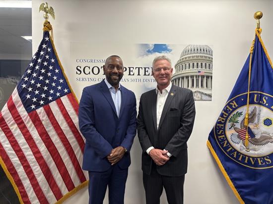 Rep. Peters meets with a representative from Urban League