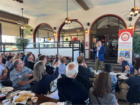 Rep. Peters speaks to a crowd of people at a Albondigas San Diego luncheon