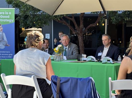 Rep. Peters listens to a childcare provider share their perspective