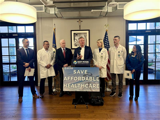 Rep. Peters speaks at a press conference on healthcare affordability