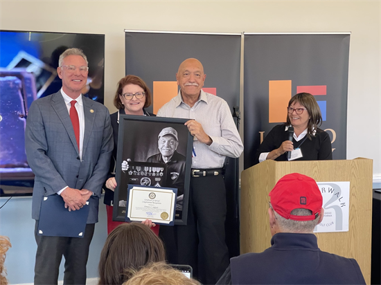 Rep. Peters presents a certificate to a San Diego veteran