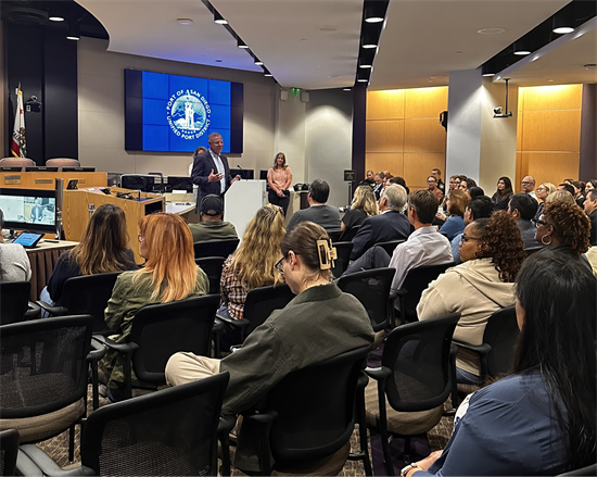 Rep. Peters speaks to a crowd at the San Diego Port