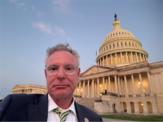 Rep. Peters stands in front of the capitol at sunrise on July 3rd, 2025