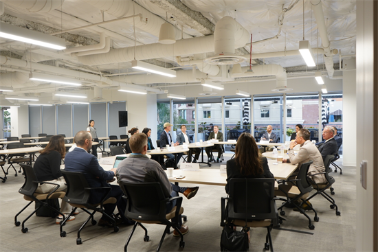 Rep. Peters speaks with a group of clean energy and labor professionals