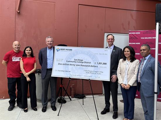 Rep. Peters and representatives from City College with a ceremonial check